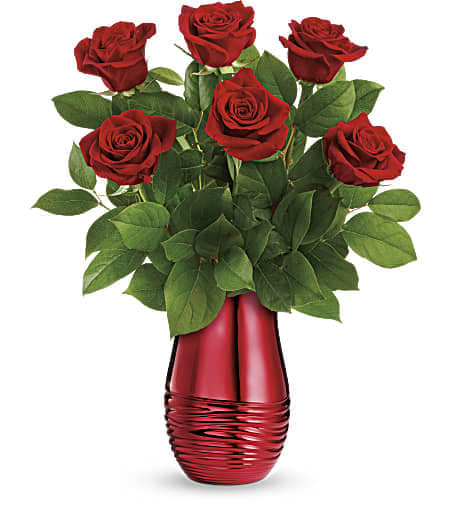 Teleflora's Rouge Romance Bouquet - The epitome of romance, this classic red rose bouquet looks oh-so-luxurious in a magnificent rouge ceramic vase. This bouquet of 6 red roses is accented with lemon leaf. Delivered in a Radiantly Rouge Vase. Approximately 14 3/4&quot; W x 18 1/4&quot; H 
