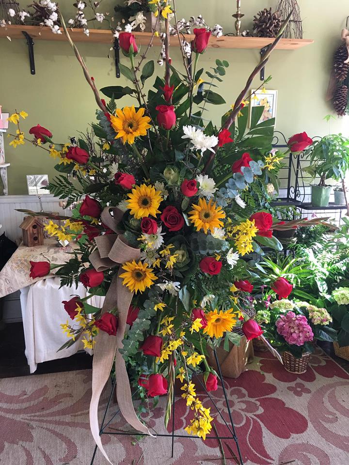 Rose And Sunflower Standing Spray By Occasions Florist Gainesville Rose And Sunflower Standing Spray By Occasions Florist Gainesville