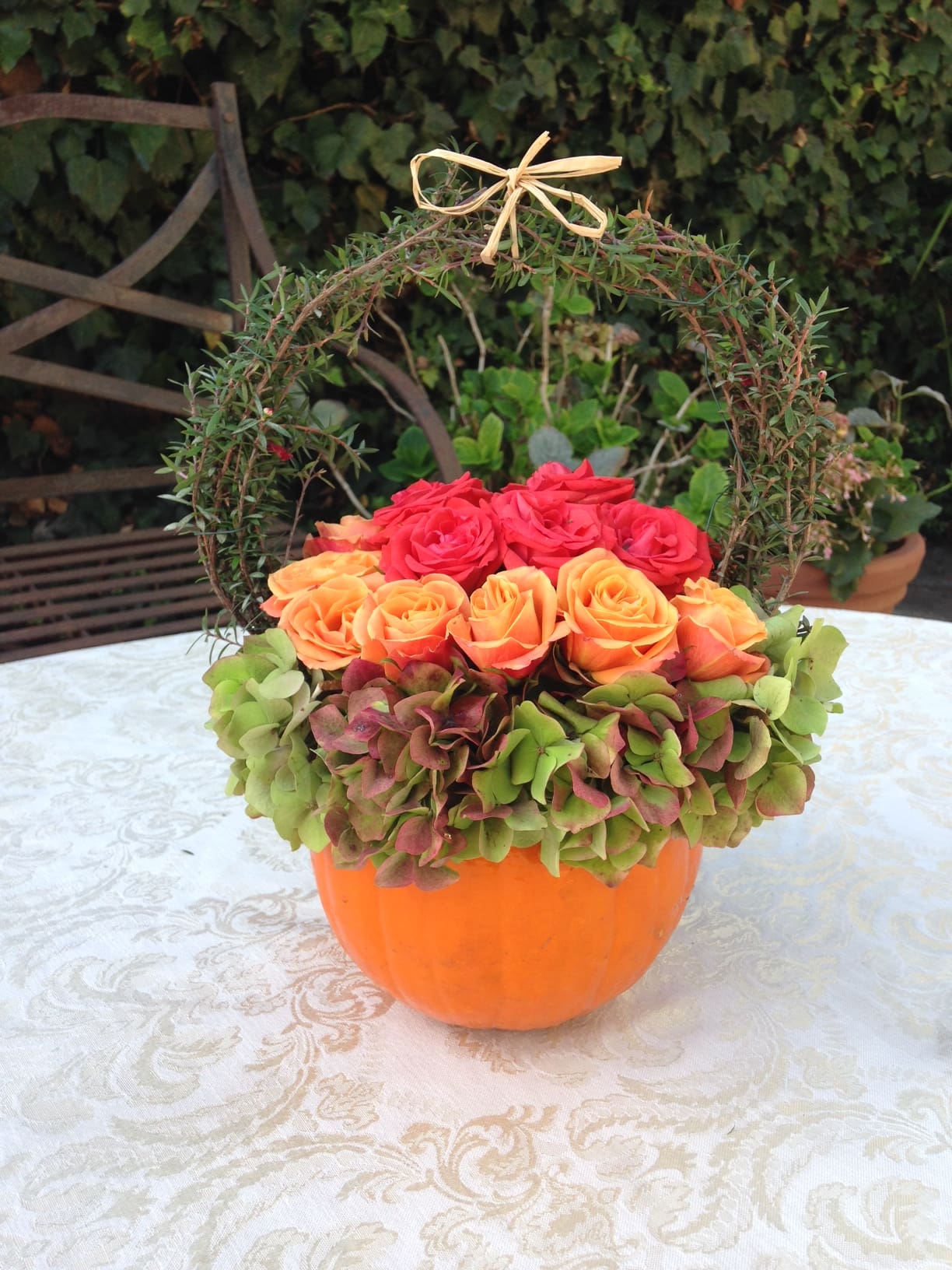 Pumpkin Topiary Pumpkin Topiary - This is a fun topiary pumpkin with packed roses.