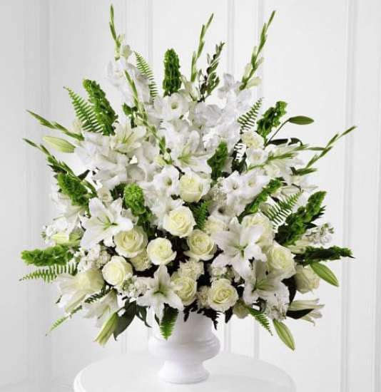 Exquisite large white sympathy flowers - This exquisite large white sympathy flowers is overflowing with beautiful blooms Order these sympathy flowers for a funeral, or to deliver to the home of a friend, relative or colleague to express your heartfelt condolences