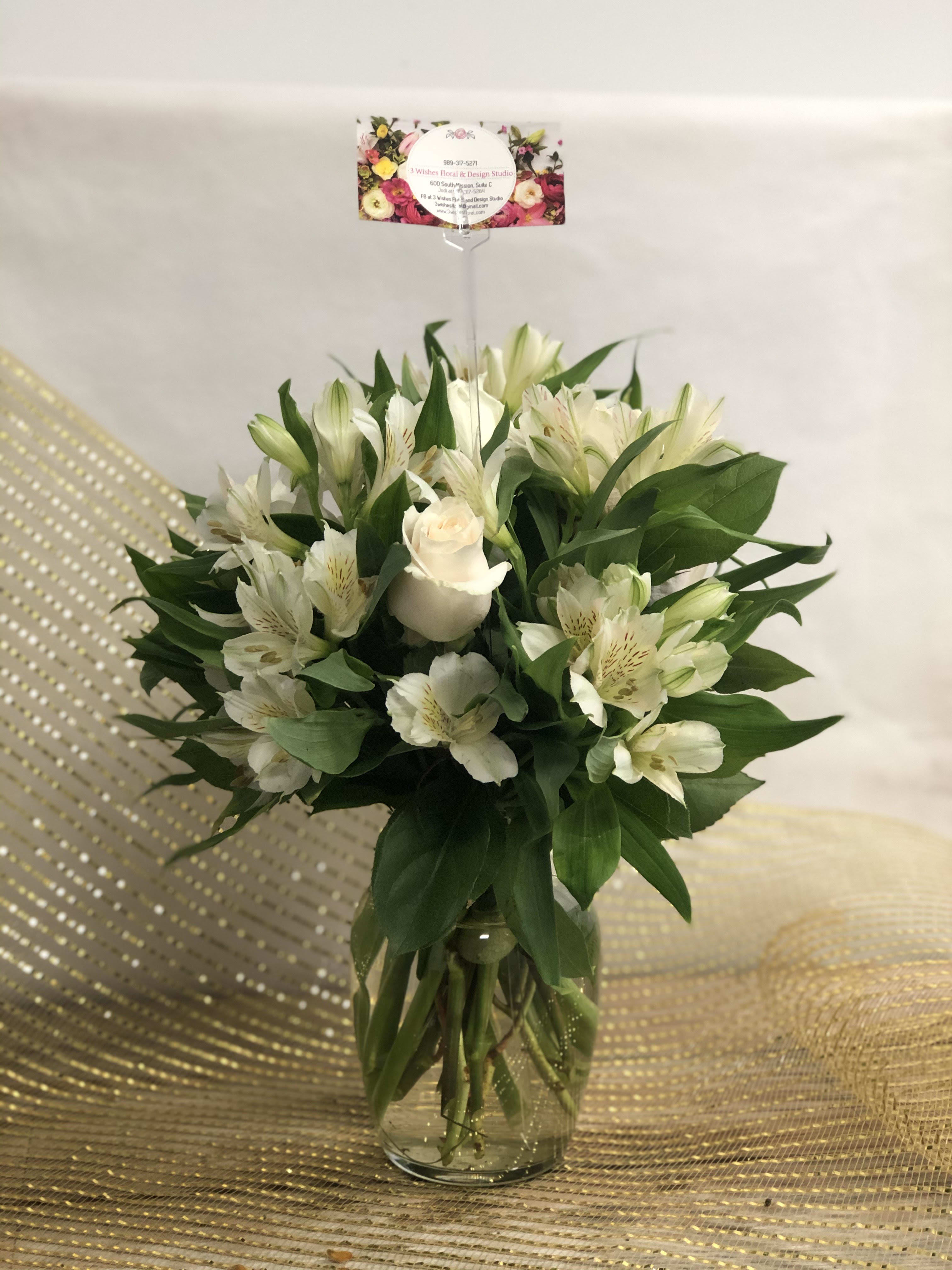 White Elegance - White alstroemeria and white roses are just the right touch of elegance to let someone know you are thinking of them. 