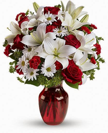 Be Mine Be Mine - The spirit of love and romance is beautifully captured in this enchanting bouquet. It's the perfect gift for anyone you love. Red roses and carnations are exquisitely arranged with white asiatic lilies and chrysanthemums in a ruby red glass vase.