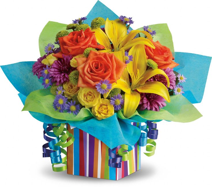 Rainbow present - What to give that special someone? Would a rainbow do? Seems nearly every shade of the spectrum bursts from this colorful gift box of blooms, complete with celebratory streamers and tissue paper.
