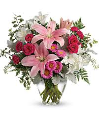 Blush rush bouquet -  Sure to make them blush! Spoil them on a special day, or just because, with this luxurious lily arrangement in gorgeous shades of blush pink.