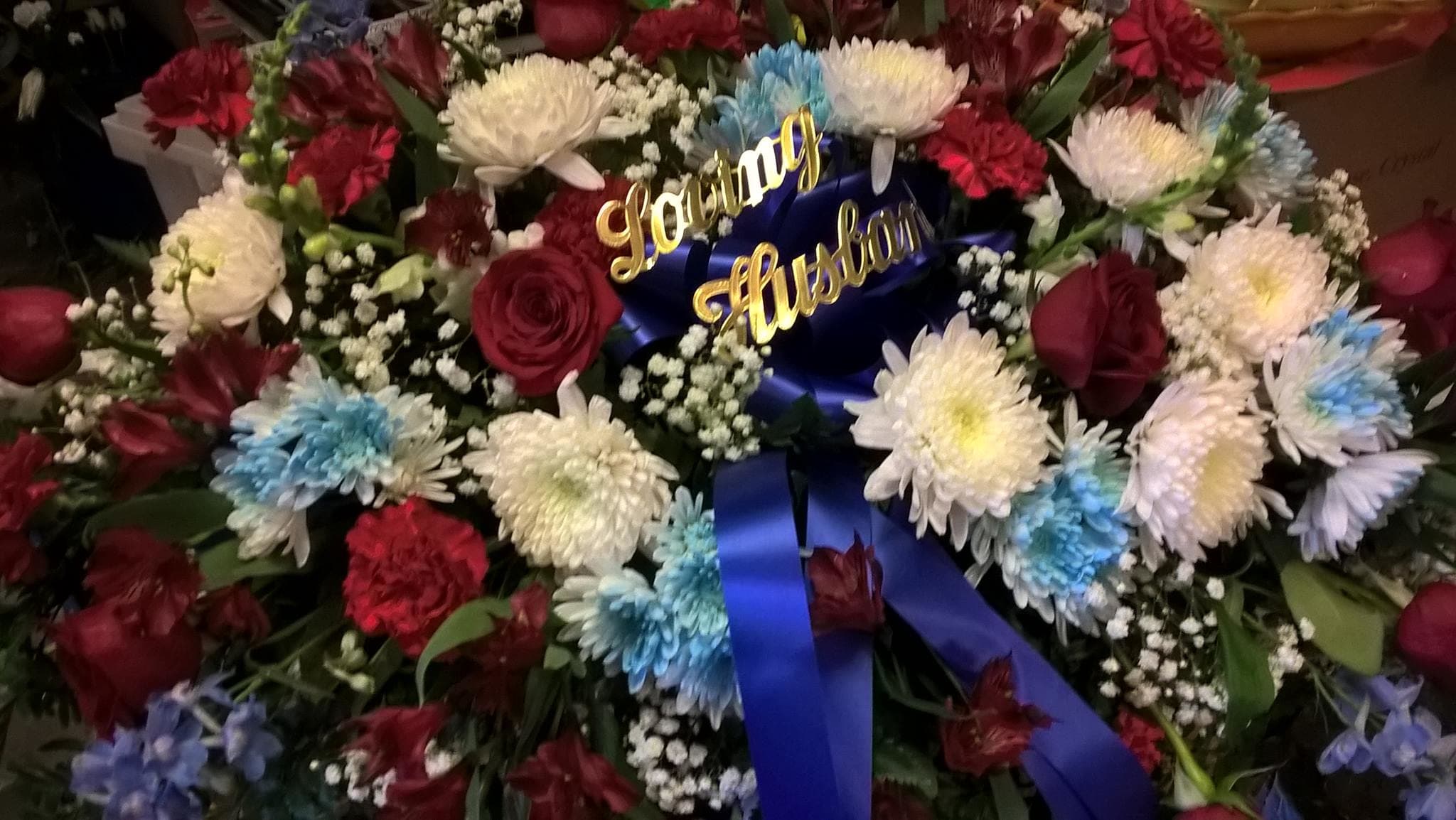 Distinguished Honor Casket Spray Distinguished Honor Casket Spray - We honor those who have served with this full casket spray, proud and patriotic way to pay lasting tribute to an loved one's esteemed memory, life of service and dedication to freedom.