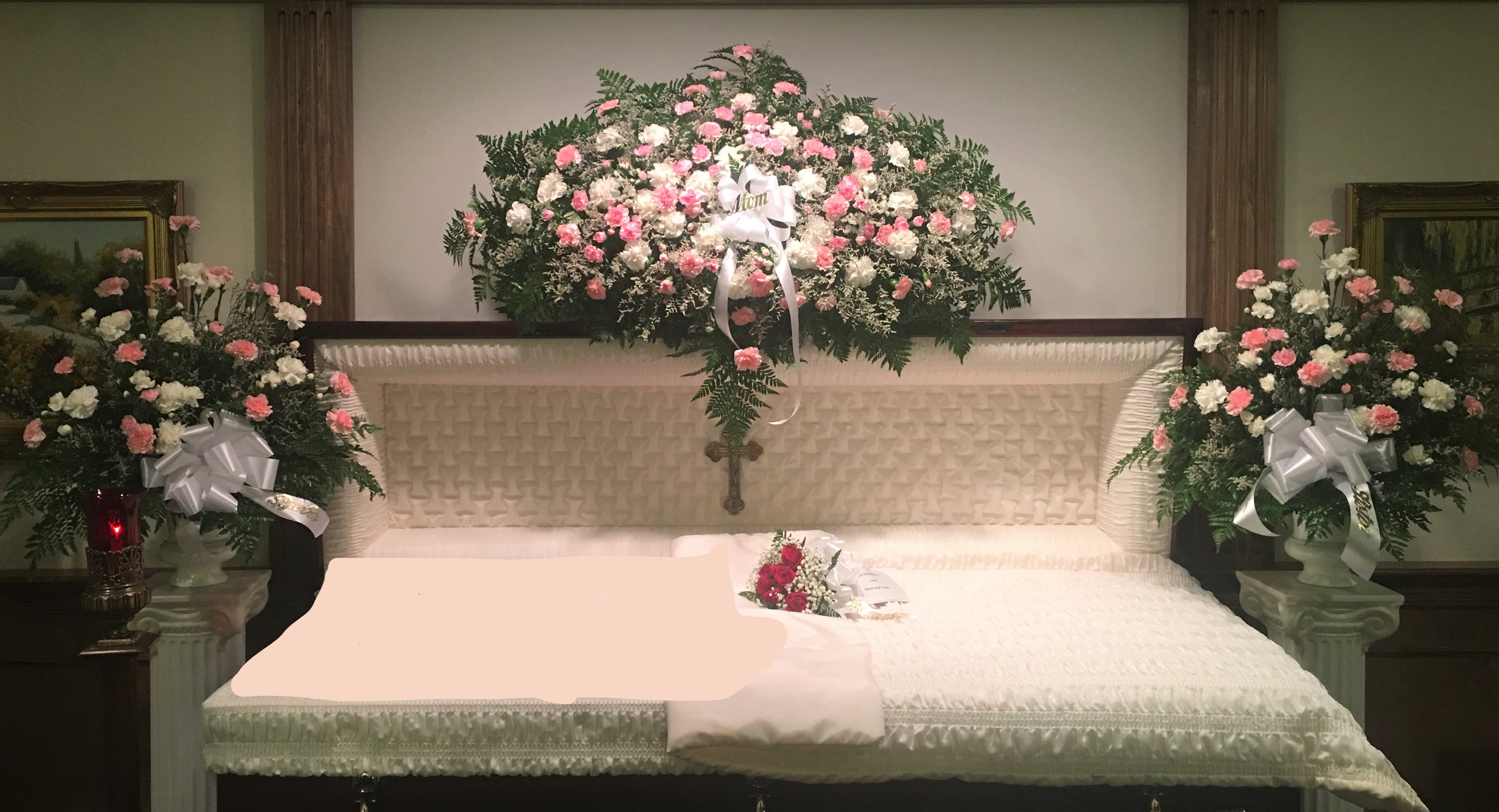 Pink Serenity Funeral Suite Pink Serenity Funeral Suite - Generous pink and white arrangements to remember your loved one. A lovely suite of arrangements in pinks and whites. This includes, a casket spray, two matching pieces and a precious inside piece on a lace pillow.