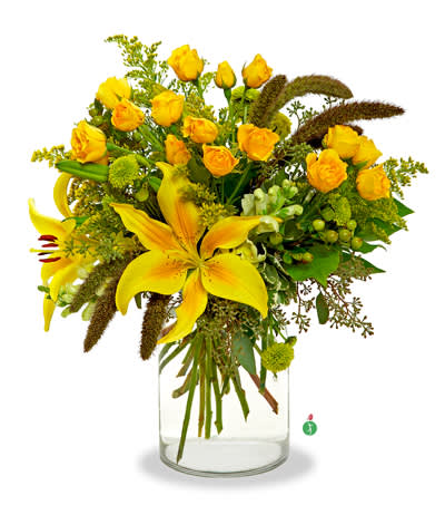 Good as Gold - Citrus-hued blossoms – including roses, lilies and more – create a mix of mellow yellows in this pretty bouquet, that’s as sweet as a lemon chiffon pie. The perfect way to brighten someone’s day!
