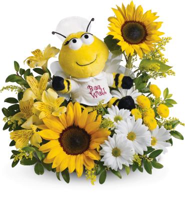 Bee Well Bouquet -   We have just the cure for what ails them. A plush nurse bee is ready to buzz into service with enough fresh flowers to make anyone perk up.  A plush bumble bee surrounded by sunny yellow sunflowers, yellow button chrysanthemums, alstroemeria and white daisies. 