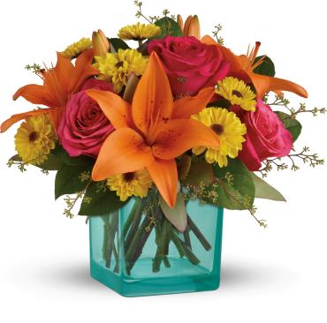Fiesta Bouquet -  Make any day feel like a fiesta with these fabulous flowers! Hand-delivered in a stylish turquoise cube vase for the perfect contrast, these fun fuchsia roses and bright orange lilies are instant mood-lifters! 