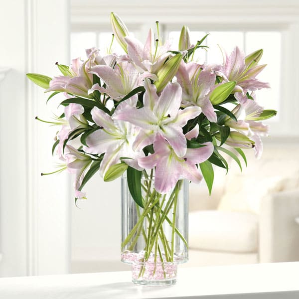 Ooh-La-La Lilies - This dramatic design features pink Oriental lilies nestled in pink &quot;crushed ice.&quot; Ooh-la-la!