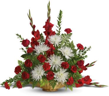 Enduring Grace -   Designed for the memorial service, this stunning array of red roses, red gladioli and more is a beautiful expression of sympathy and caring.  The radiant bouquet includes red roses, red gladioli, red carnations and white spider chrysanthemums, accented with assorted greenery. 