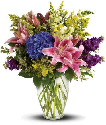 Love Everlasting Bouquet -   This lovely bouquet of pink lilies, blue hydrangea and other floral favorites is an eloquent expression of caring. The family will be touched by your thoughtfulness.  The stunning bouquet includes blue hydrangea, pink oriental lilies, yellow snapdragons and purple stock, accented with assorted greenery. 