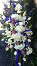 BLESSING EASEL - ALL PURPLE AND WHITE TONES, WITH BEAUTIFUL LILIES, ROSES ,HYDRANGEA'S AND MORE. PURPLE RIBBON THRU OUT AND  SITS ON A FIVE FOOT EASEL.