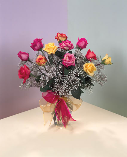 ON SALE WAS $65- LOVING EMBRACE ROSES - CHEERFUL RAINBOW OF MULTI- COLOR LONG STEM ROSES ,DESIGNED IN A VASE WITH A PRETTY BOW.