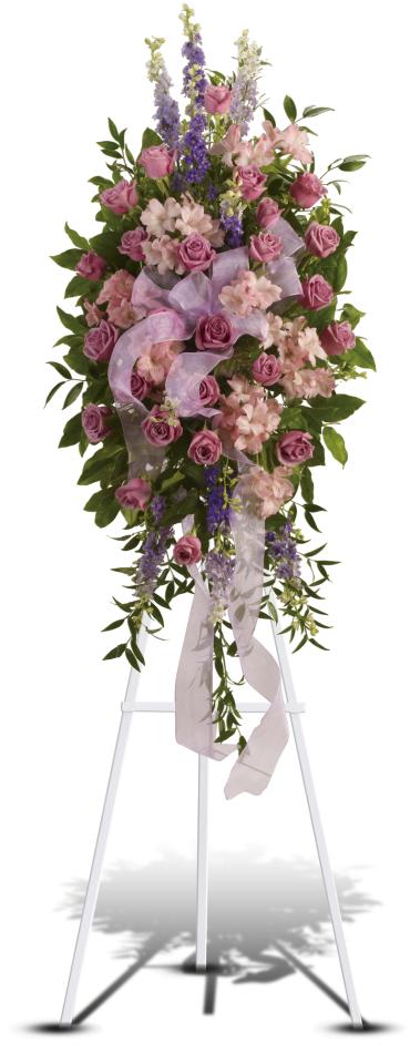 Finest Farewell Spray -   This abundant spray of soft, feminine spring colors feels as calming as a walk in the countryside. Sheer organza ribbon is threaded through lavender, purple and pink blooms that are accented by trailing greens. 