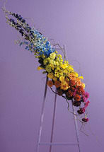 TEAR DROP TEAR DROP - EXPRESS YOUR SORROW WITH THIS TEAR DROP EASEL. ROSES, SNAPDRAGONS, GERBERS, LILIES AND MORE. A BEAUTIFUL ASSORTMENT OF COLORS. SITS ON A 5 FOOT EASIL.