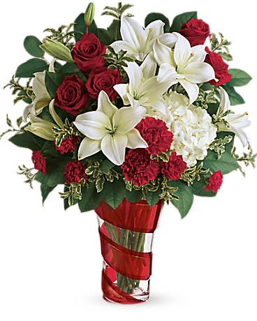 Teleflora's Work Of Heart Bouquet - Wrapped in a ribbon of crimson glass this gorgeous art piece is the perfect presentation for a breathtaking Valentine&#039;s Day bouquet of roses and lilies.