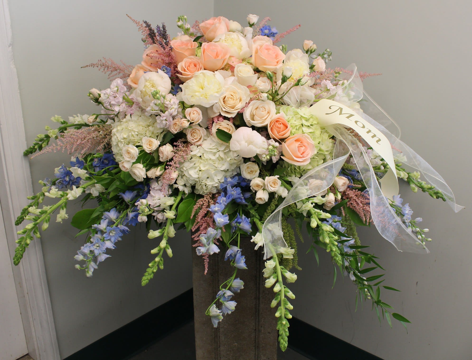 Evans Pastel Casket Funeral Blanket in Peabody, MA Evans Flowers