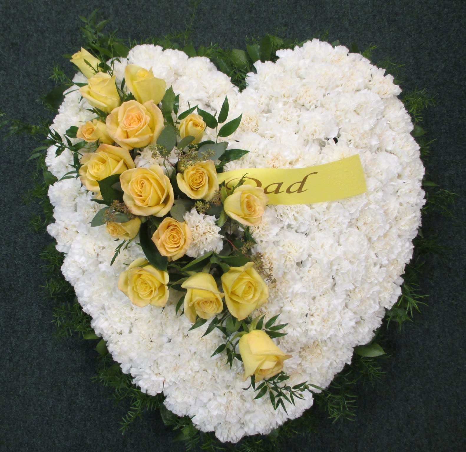 Evans Large Solid White Funeral Heart With Yellow Rose Break By Evans Flowers A huge bouquet of beautiful roses as a gift for a beautiful girl. evans large solid white funeral heart with yellow rose break by evans flowers