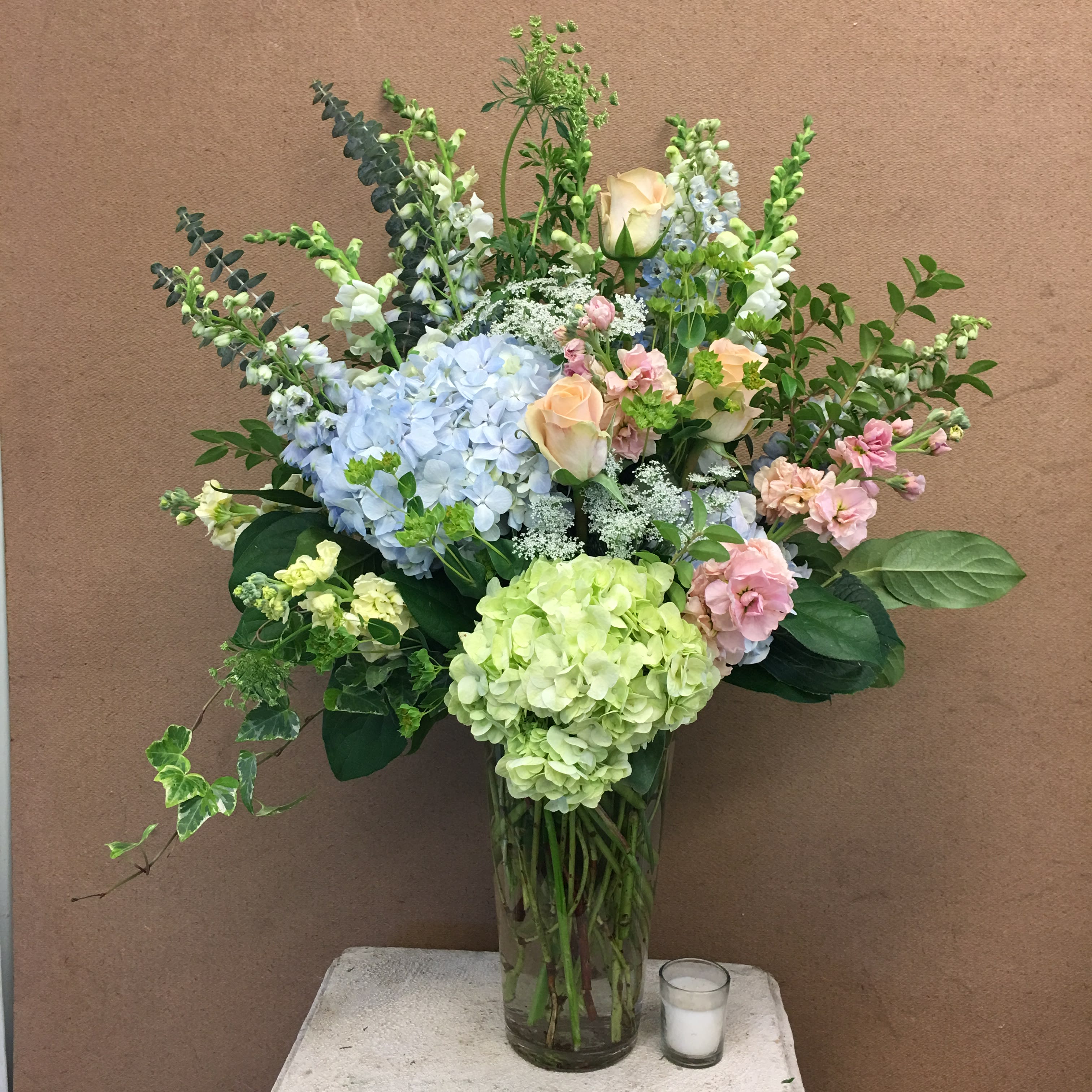 Evans Peach Green Blue Vase Arrangement In Peabody Ma Evans Flowers See more ideas about flower vases, flower arrangements, floral arrangements. evans peach green blue vase arrangement in peabody ma evans flowers
