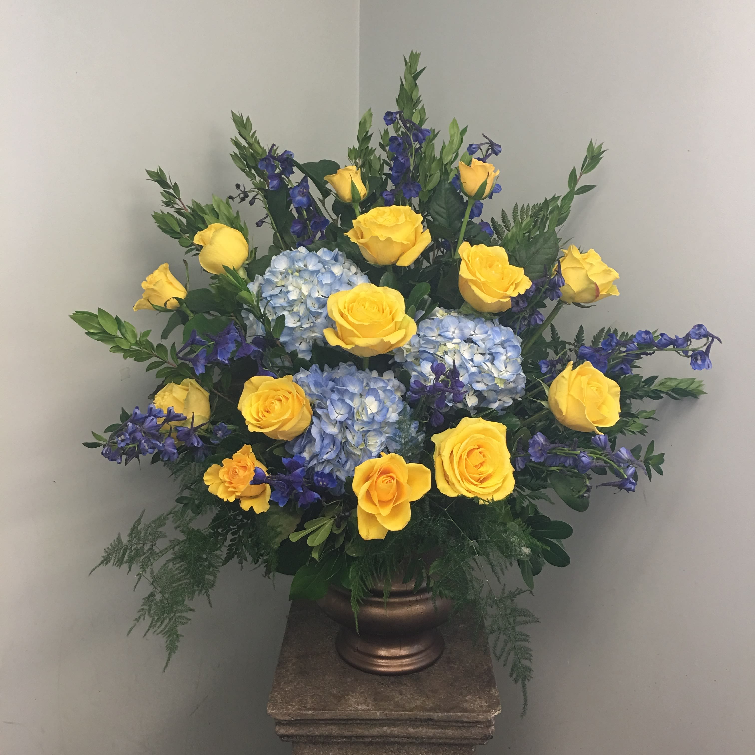 Evans Blue Yellow Funeral Urn In Peabody Ma Evans Flowers Memorial flowers are a beautiful tribute to the departed. evans blue yellow funeral urn in peabody ma evans flowers