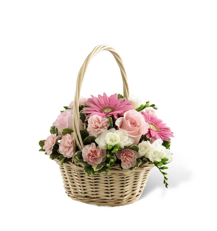 The FTD Enduring Peace Basket - The FTD Enduring Peace Basket is bursting with grace and sweet elegance to honor the life of the deceased and offer comfort to the friends and family suffering from their loss. White freesia pop against a bed of pink gerbera daisies, roses and mini carnations, gorgeously accented with lush greens and arranged in a small oval whitewash willow basket, to create a beautiful way to convey your deepest sympathies.