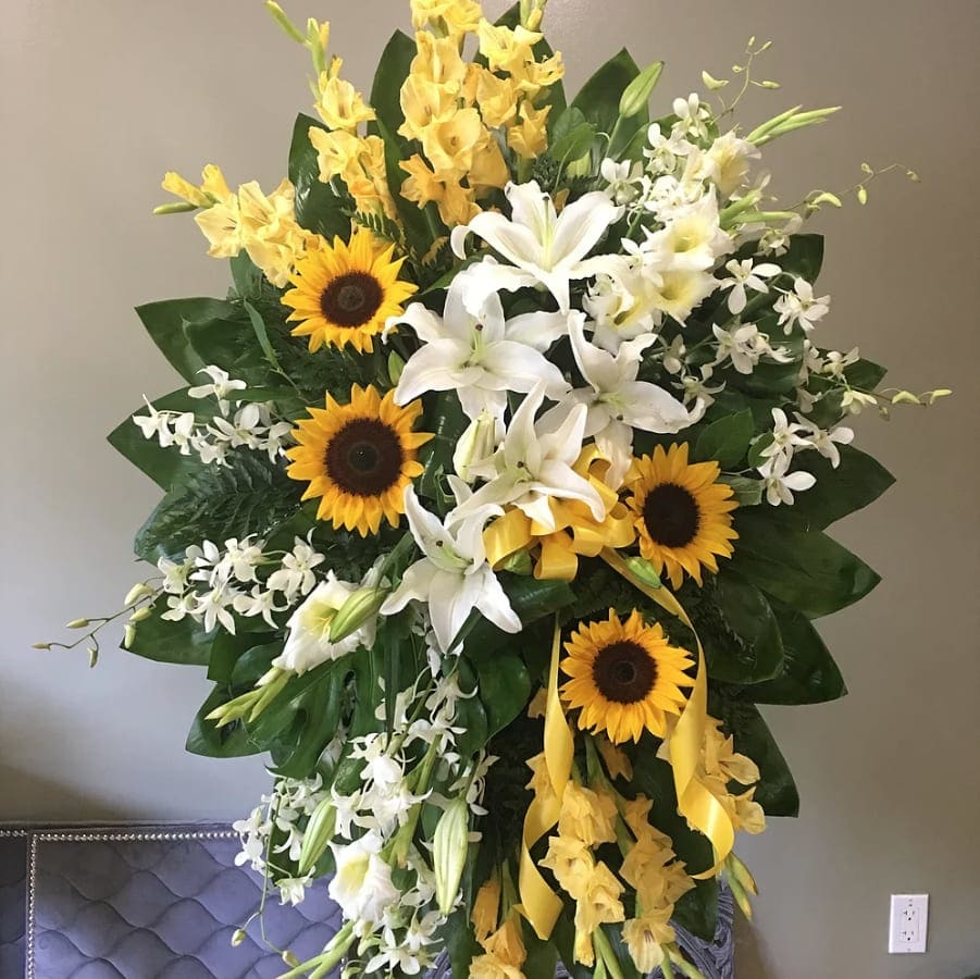33 SUNFLOWERS SPRAY WREATH by Stanley Ito Florist