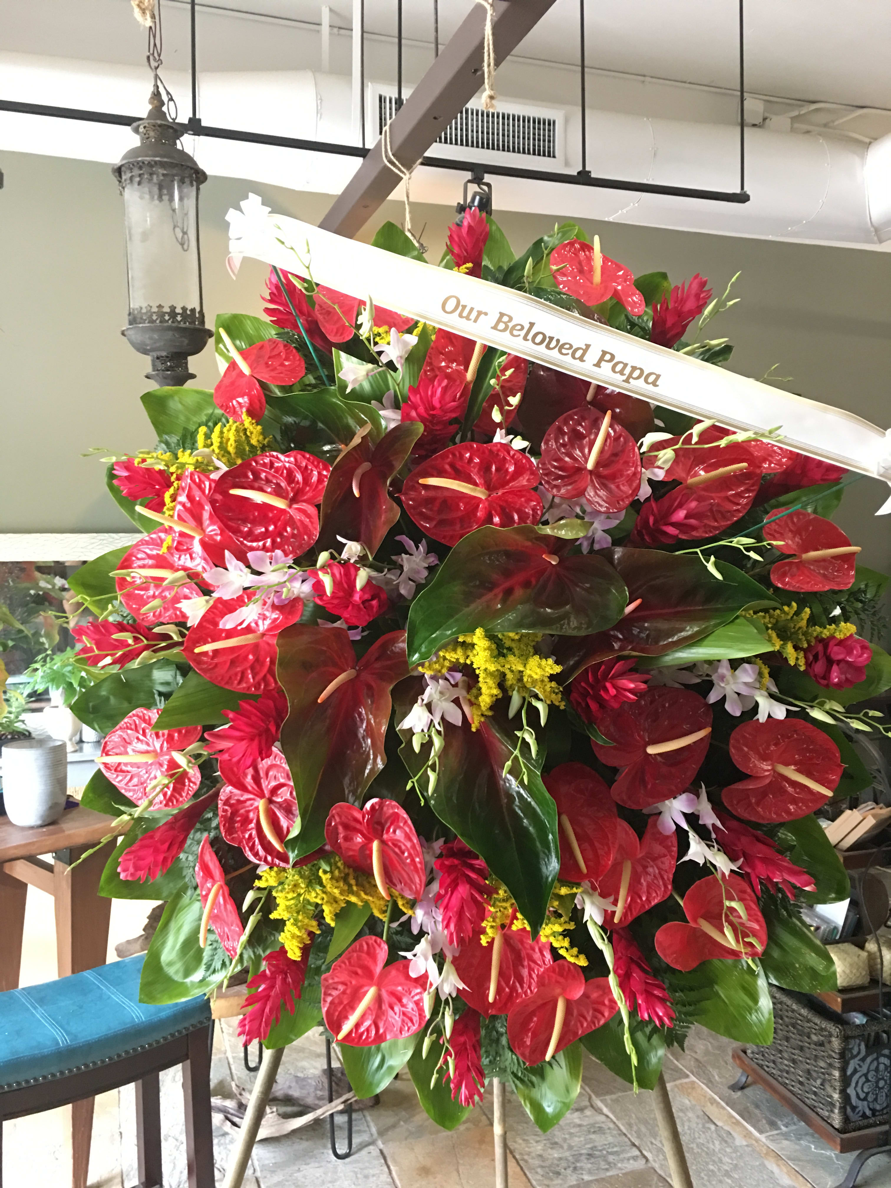 red and obake anthuriums wreath in Honolulu, HI Stanley Ito Florist