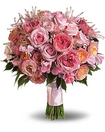 Pink Rose Garden Bouquet - A luxurious mix of light pink rose varieties is accented with fragrant sweet pea and delicate astilbe for a fun feminine effect.
