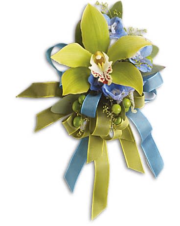 Big Night Orchid Corsage Big Night Orchid Corsage - Make a chic statement with green cymbidium orchids and blue delphinium.
