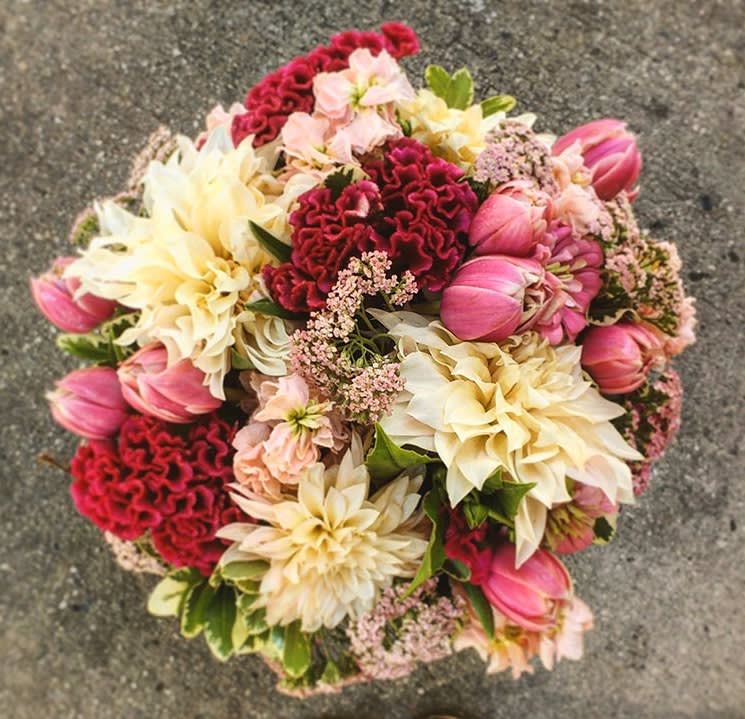 Peach dahlias with pink tulips and celosia in New York, NY Garage Flowers