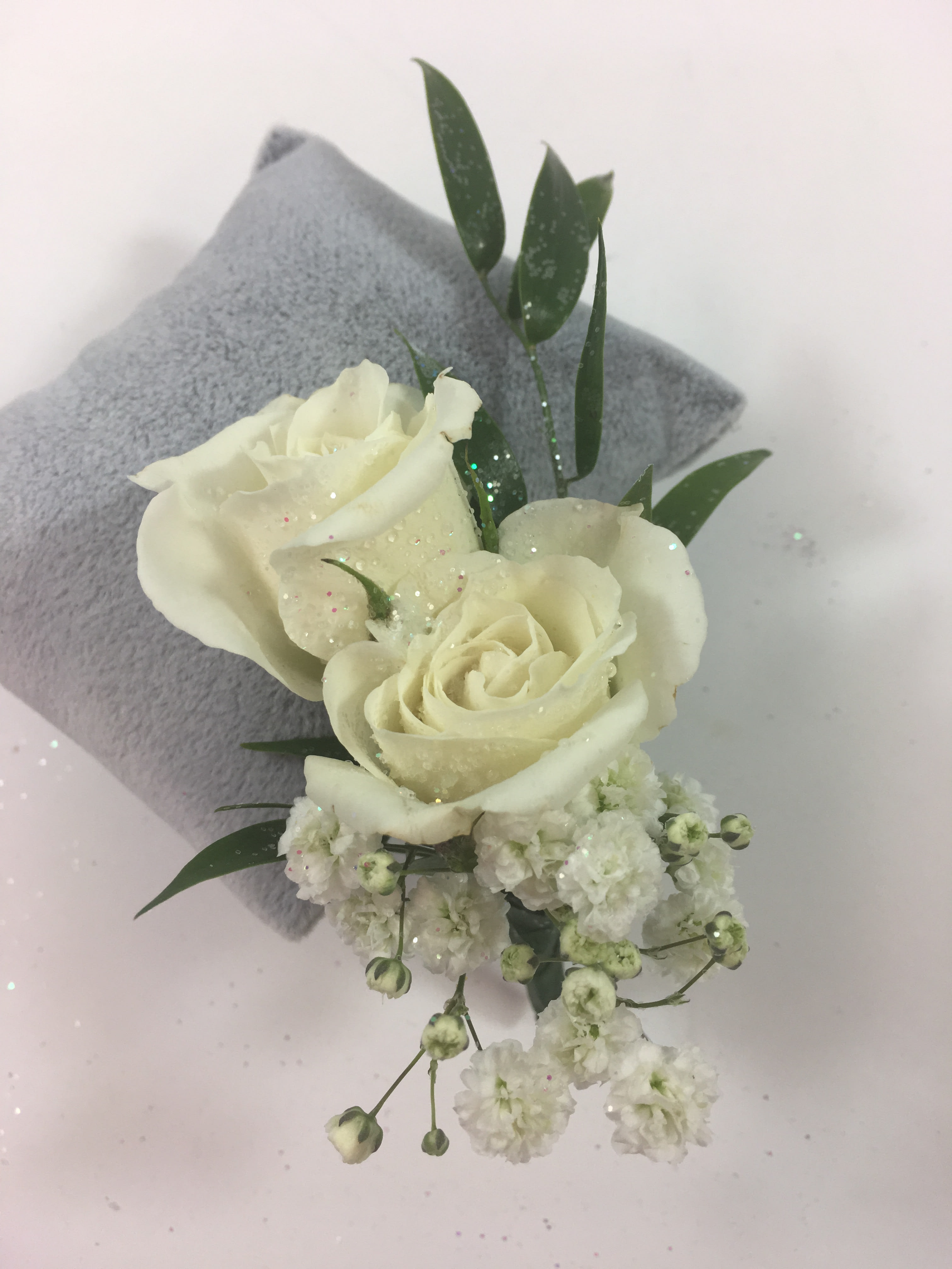 B2 White Spray Rose boutonniere in Bensalem, PA | Flower Girl Florist