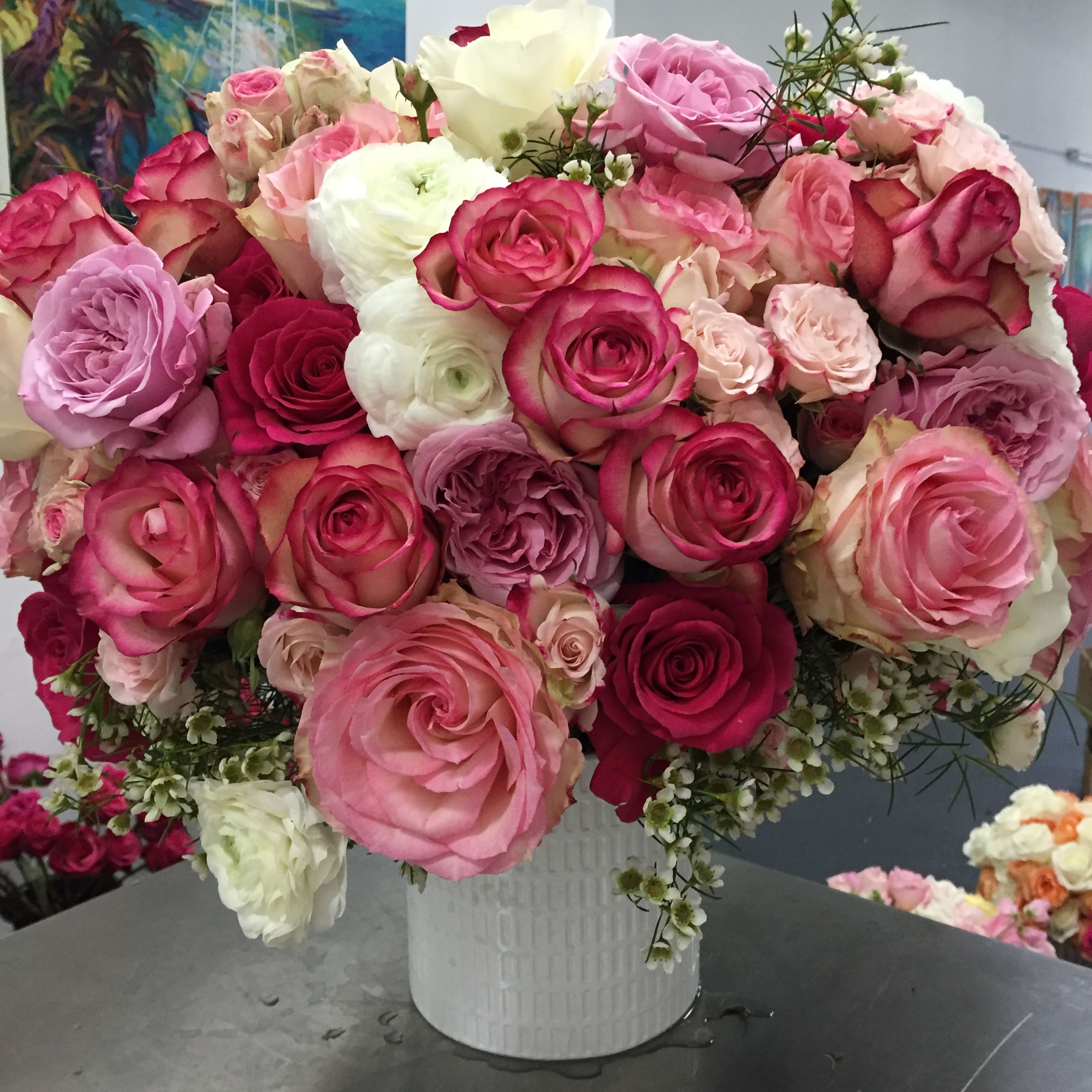 Sweet Serenity Sweet Serenity - These Beautiful Blooms Personally Gathered by our Head Designer, Carey Hotchkis, will bring Blissful Happiness to your loved one! This Airy and Organic Arrangement Spills out of a white ceramic Vase, giving the feeling of just picked from the garden.