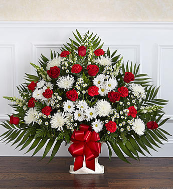 Heartfelt Tribute™ Floor Basket- Red &amp; White - Majestic red and white blooms symbolize a special tribute of heartfelt love and adoration. Our elegant floor basket arrangement, handcrafted by our expert florists with radiant red and white blooms, is a tasteful gesture perfectly suited for the funeral home or memorial services.