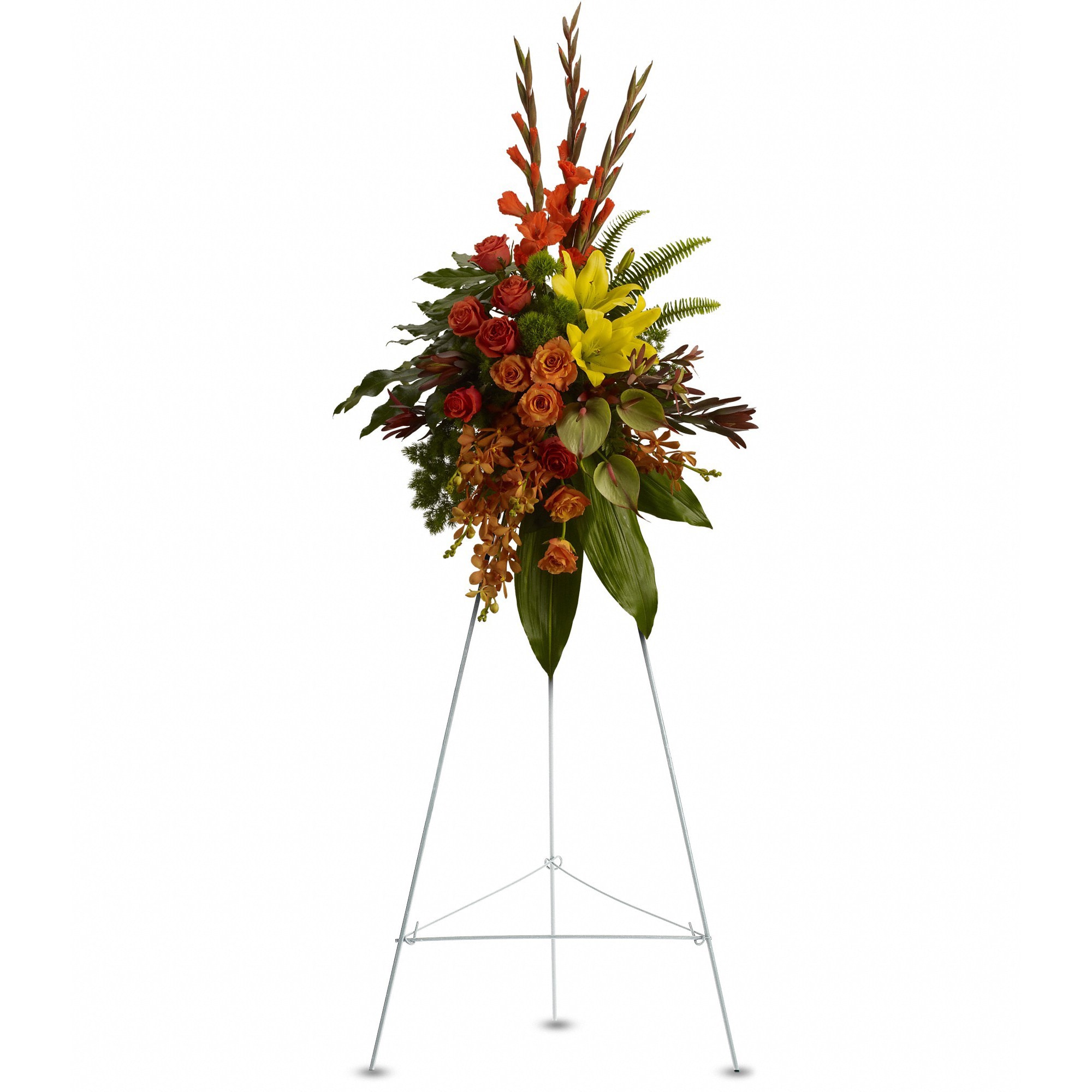 Tropical Tribute Spray by Teleflora - Tropical highlights balance with lush earth tones to offer hope and encourage reflection - a vivid spray that expresses deep and generous tribute.  