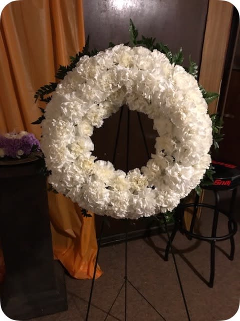 Celebration - 18inch round white Carnation wreath