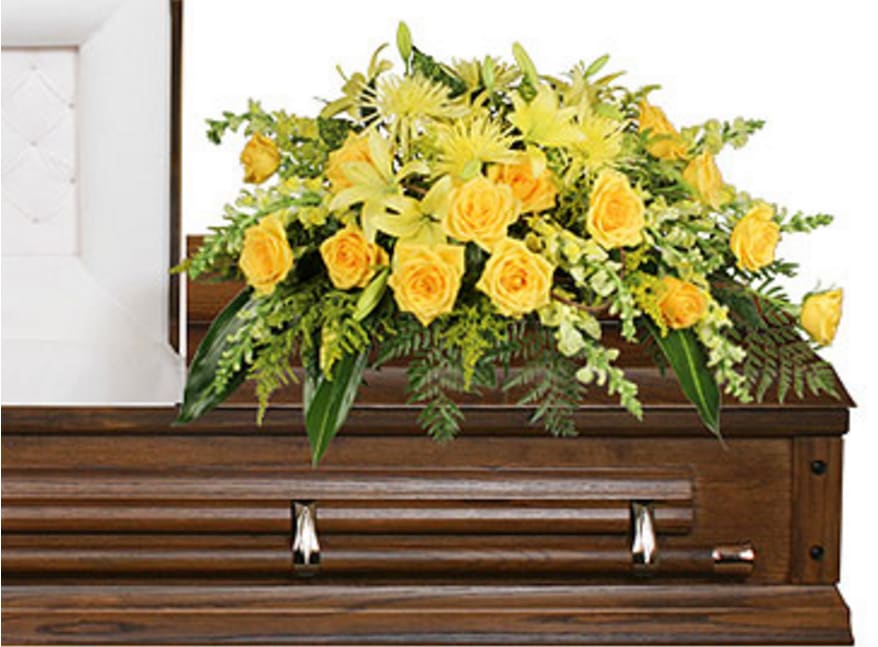 CF2108 - Full Sun Memorial Full Sun Memorial features a lush assortment of  Leather Leaf, Jade, Variegated Aspidistra Leaves, Variegated Aucuba, Yellow Roses, Yellow Snapdragons, Yellow Spider Mums (Fuji), Yellow Lilies, and Solidago. 