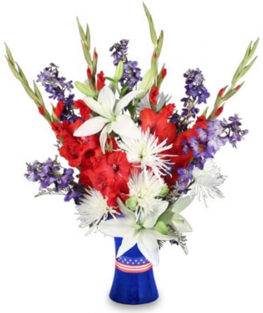 Red, White, &amp; True Blue - Red, White, &amp; True Blue features a patriotic assortment of Leather Leaf, White Lilies, White Spider Mums (Fuji), Blue Delphinium, Red Gladiolus, and Limonium (Misty Blue).   Copyrighted content provided by FlowerShopNetwork.com Proud Member of Flower Shop Network