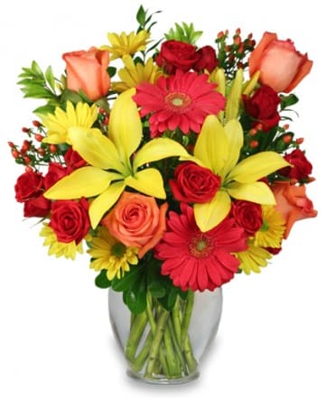 CF90093 - Bring On The Happy Bouquet Getting fresh Summer flowers is always memorable and special for your recipient - regardless of their age. Featuring red gerberas, orange roses, red spray roses and yellow lilies, our Bring On the Happy Bouquet has just what it takes to bring some fun and show you care!  Copyrighted content provided by  FlowerShopNetwork.com Proud Member of Flower Shop Network