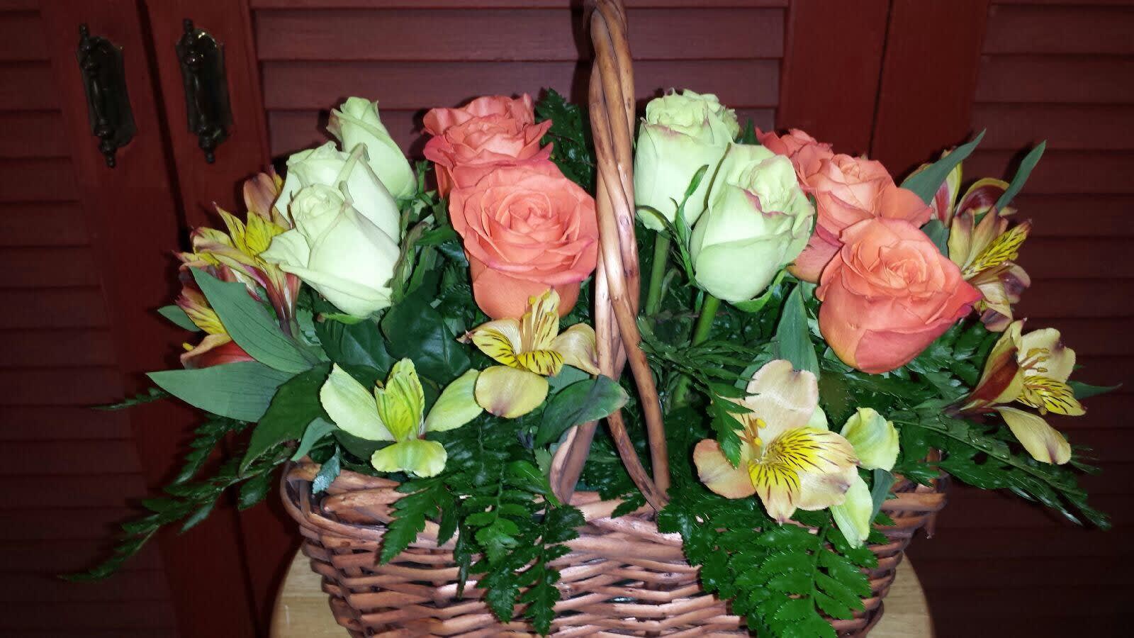 Basket arrangement of one dozen mixed roses in Bristol, PA Bristol