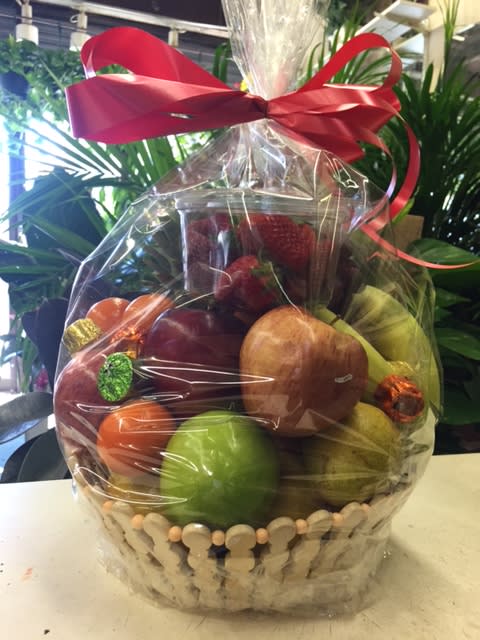Fruit Basket Fruit Basket - Gorgeous fruit basket with high quality fruits selected on a daily basis. Chocolates and Candies are also included in the basket!