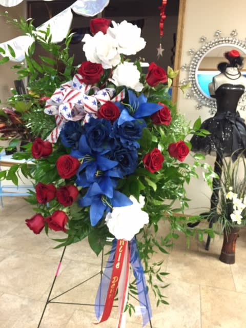 Red white and blue artificial flowers top