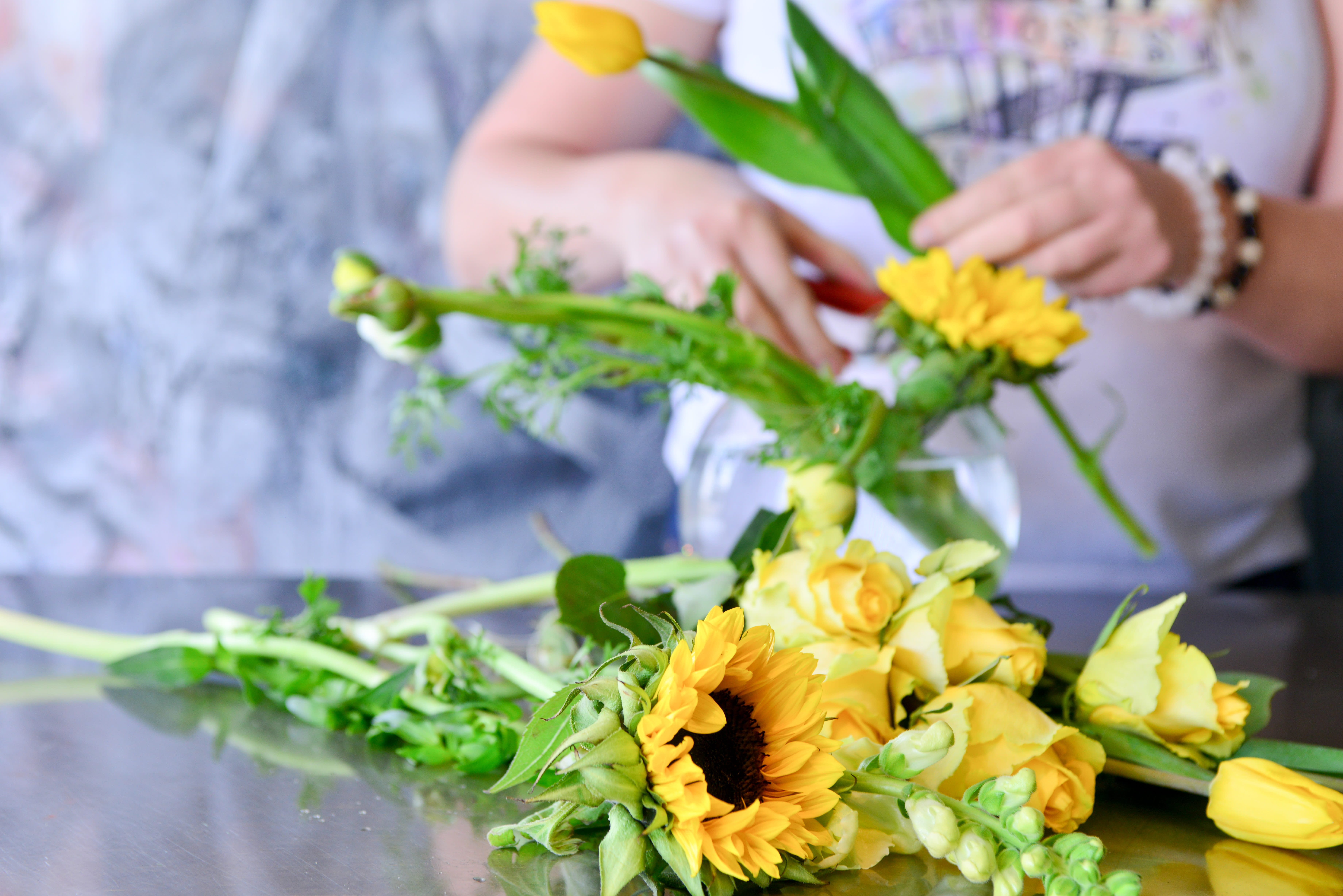 Magical Blooms Floral Design Class - Magical Blooms Floral Design Class   Learn, create  have fun! This class is one hour long. Come into our flower shop and feel like the floors. Each time you come in we provide the container the supplies needed for the design concepts the flowers and the lesson. At the end you take your beautiful arrangement home and be proud. Every session is a different theme so look at the calendar and you choose which one you’d like to design. We look forward to playing with flowers and becoming your friend. Welcome to Magical Blooms Floral Academy  Basic 10w floral design with a twist. We have common flowers along with interesting I know name Flowers. We promise to leave with a masterpiece. 