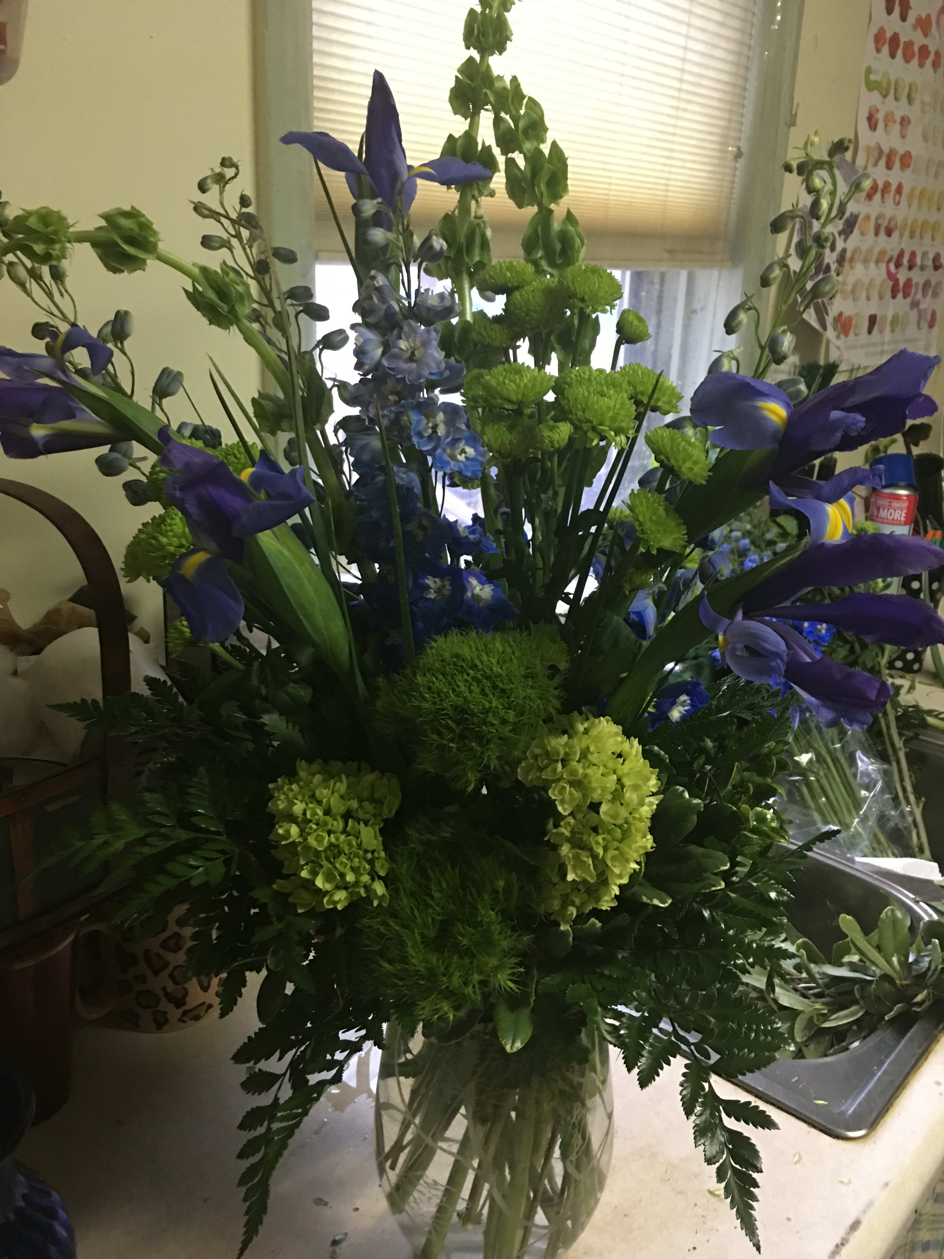St Patricks Day St Patricks Day - Green trix carnations, bells of Ireland, iris and green hydrag.
