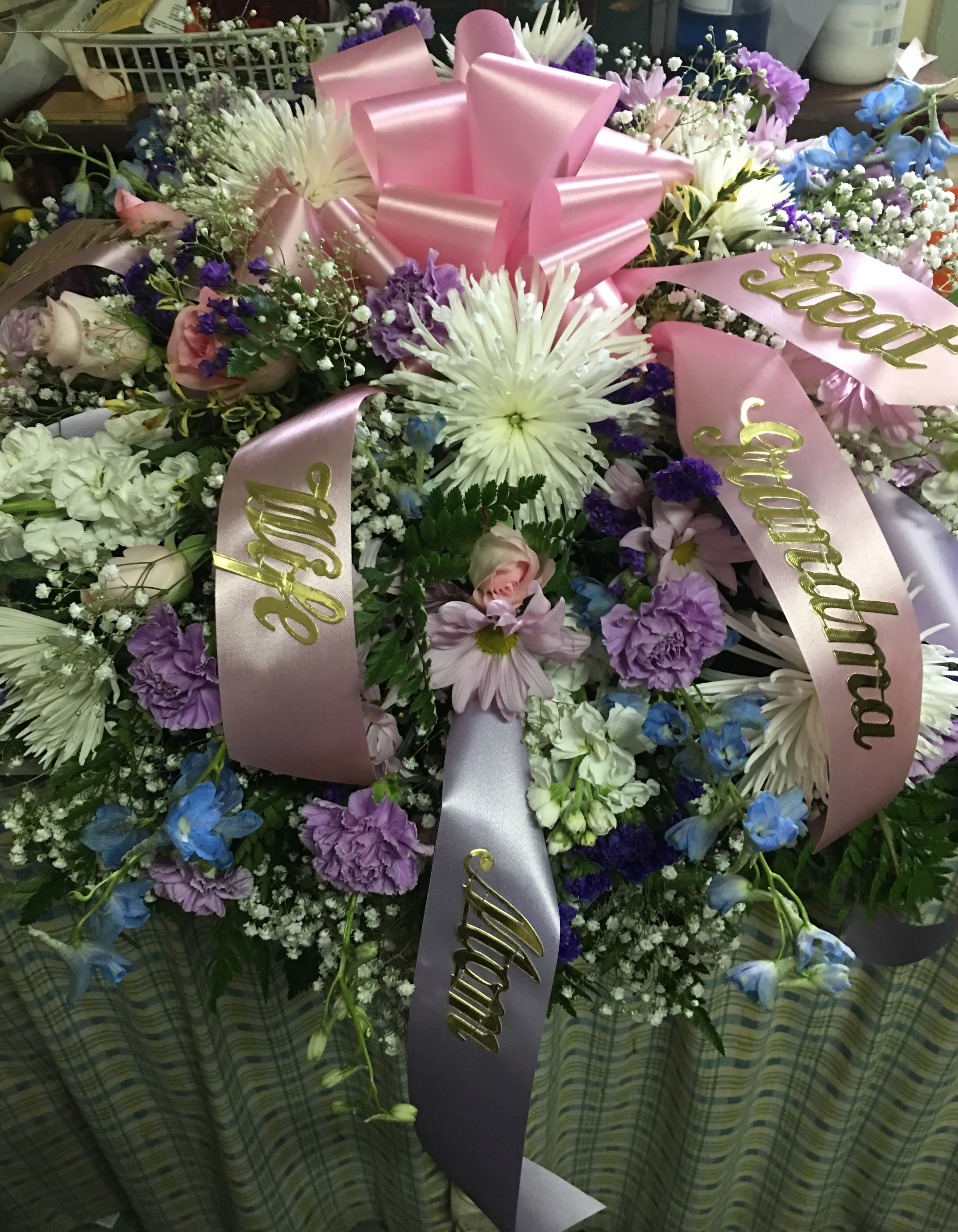 Spring colors casket spray Spring colors casket spray - Beautiful celebration of life casket spray in spring colors