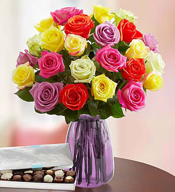 Two Dozen Assorted Roses / with a box chocalates - Send a beautiful bouquet of two dozen roses in a rainbow of colors! Featuring fresh premium blooms , it’s a gift guaranteed to make someone smile brighter than ever before! with a box of chocolates for an extra sweet surprise