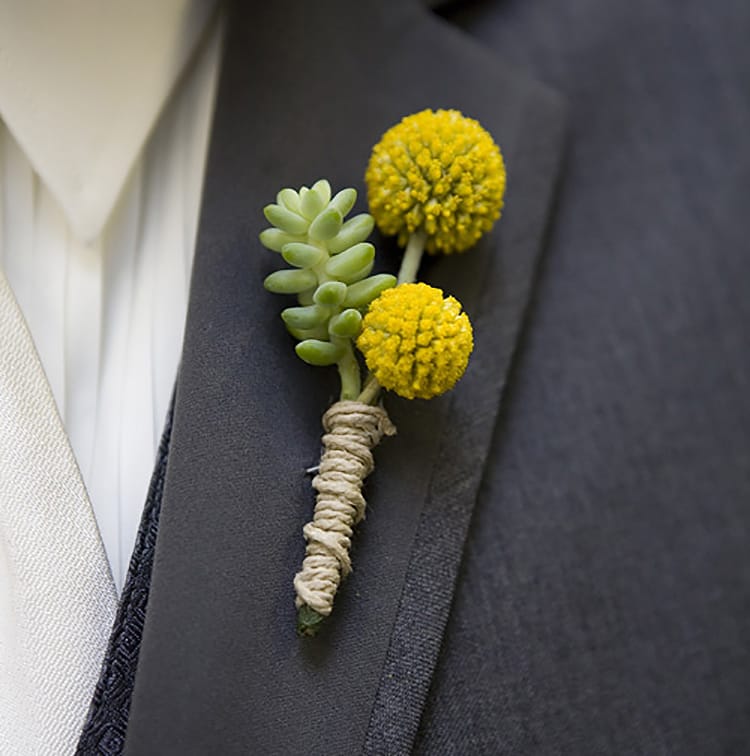 Designer Choice Boutonniere or Corsage AB10 - Sometimes you just need to leave the design decisions up to our experts! Choose either a Designer choice (Boutonniere or Corsage) in a contemporary or traditional style. Specify the preferred colors of the flowers or elements such as ribbon in the comments section of this order form and even tell us what you are wearing. We will come up with the perfect addition to your outfit based on what is seasonal and current! You won't be disappointed! All Boutonnieres and Corsages should be ordered a minimum of 3 - 5 days prior to your event. For needs sooner than that please call the store at 858-454-0146 to ensure availability. NOTE: WRIST CORSAGE BEADED AND CRYSTAL BANDS SOLD SEPARATELY. PLEASE CHOOSE PREFERRED BAND AND ADD TO ORDER.