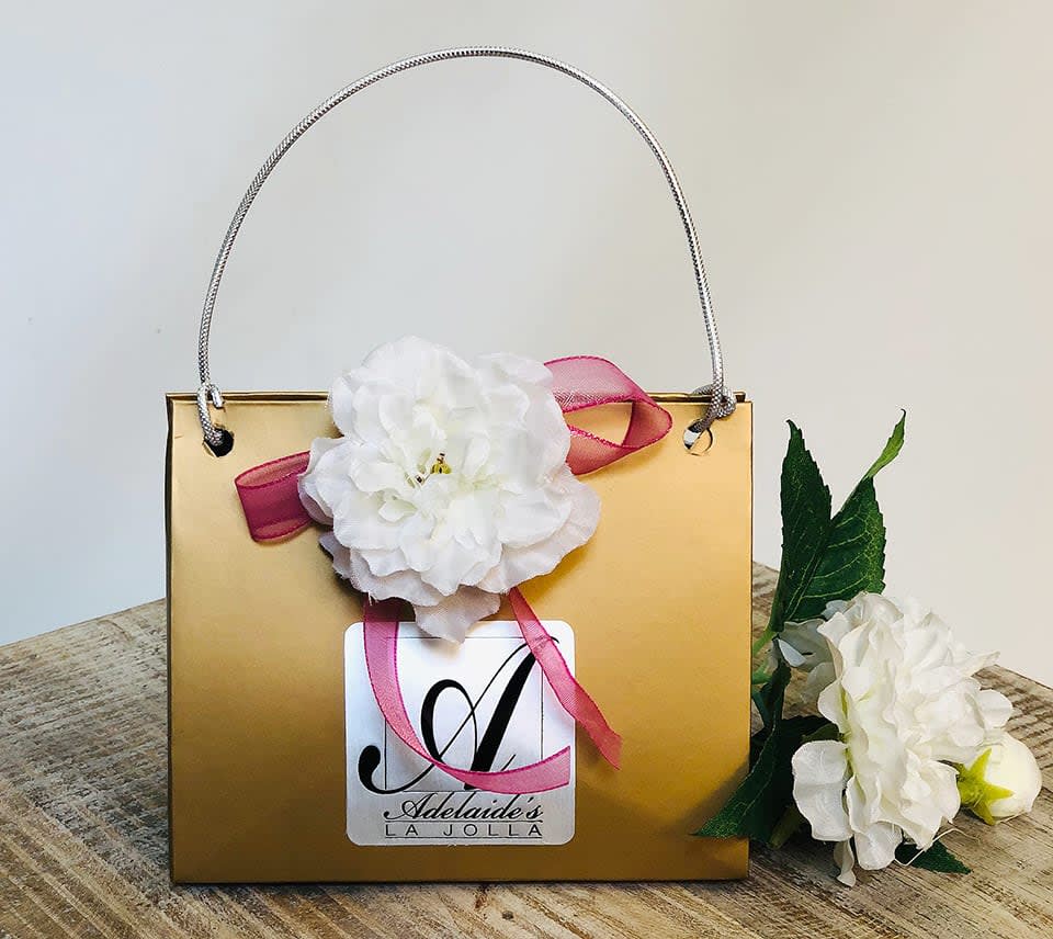 Money Purse **Gift Card - Does your Mom like to choose her own florals, plants and gifts? This is the perfect answer for what to give her on Mother's Day. An Adelaide's gift card will be artfully presented in a mini purse decorated for the occasion. Note: to purchase a different amount than listed, please contact the store directly at 858-454-0146. 