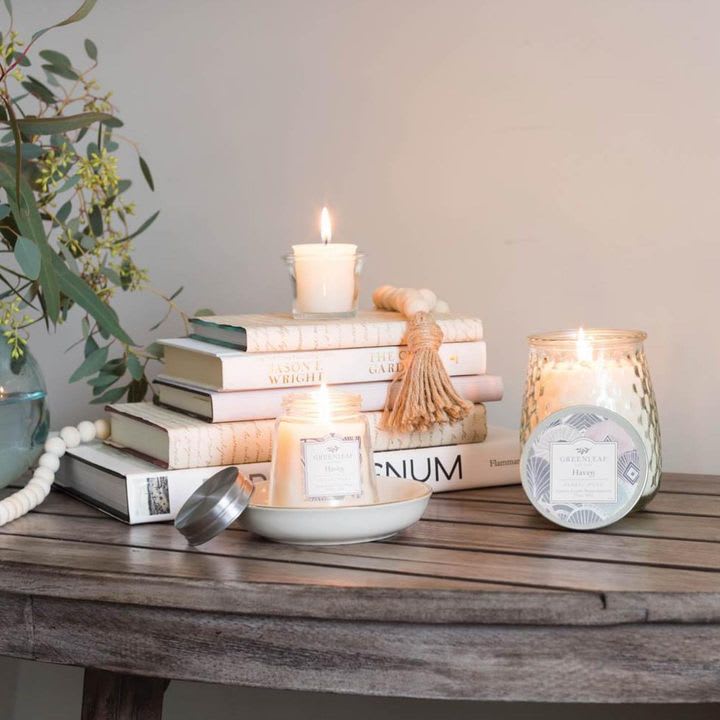 Haven Petite Candle - As revitalizing as a breath of salty beach air, Haven awakens and rejuvenates with fresh notes of seashore breeze enriched with floral qualities of lavender and jasmine. Whispers of woody amber and sweet musk signal the onset of the ultimate escape. Cute and compact in a 4.3 oz jelly jar, this scented candle is perfect for gifting or incorporating with your home decor! Each Greenleaf petite candle is made in the USA with soy-blend wax and a lead-free cotton wick. This candle will burn for up to 40 hours.