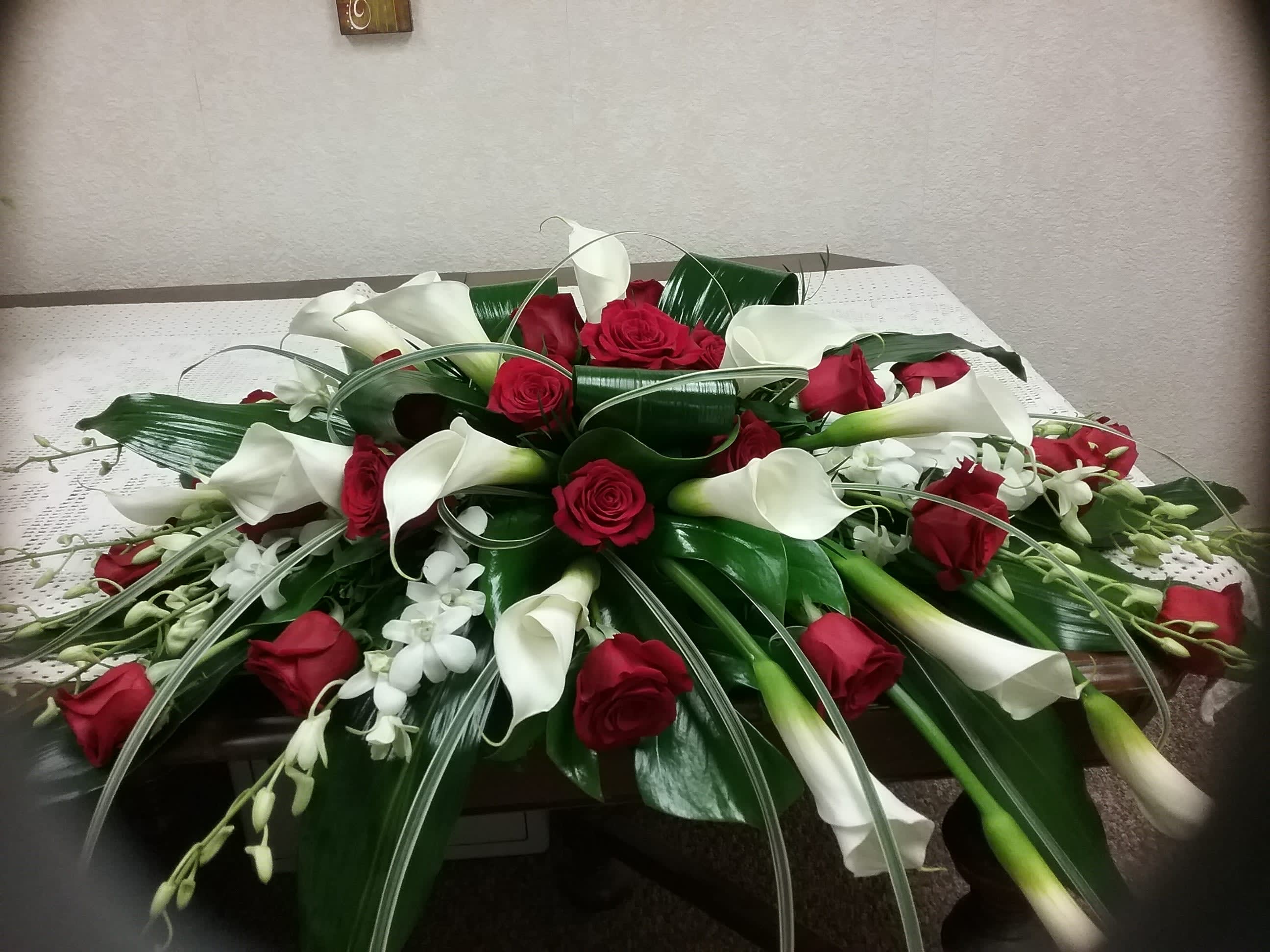 CALLA LILY AND ROSES CASKET SPRAY in Wamego, KS | The ...